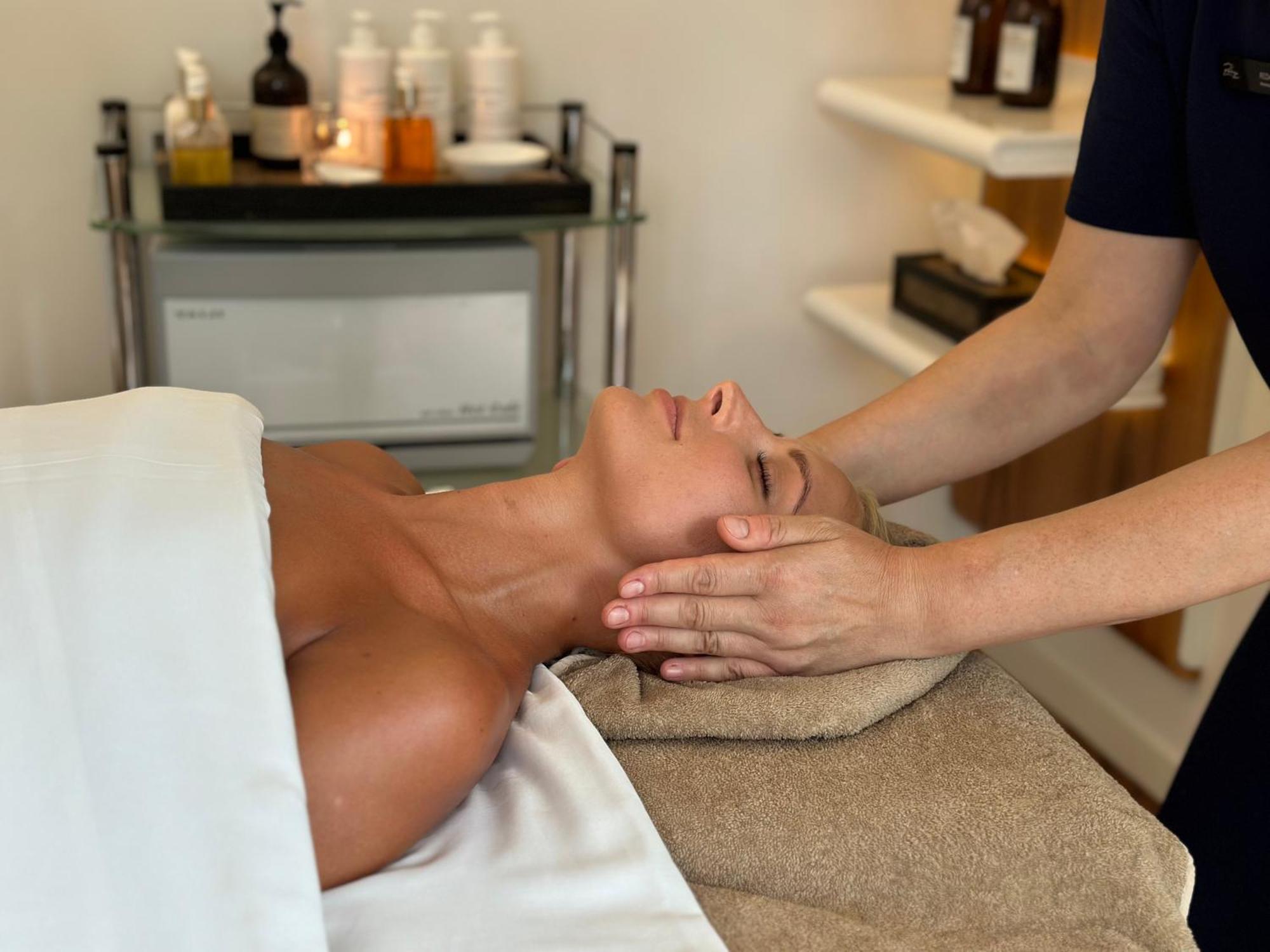 Palanga Life Balance Spa Hotel Exterior photo A woman receiving a facial massage
